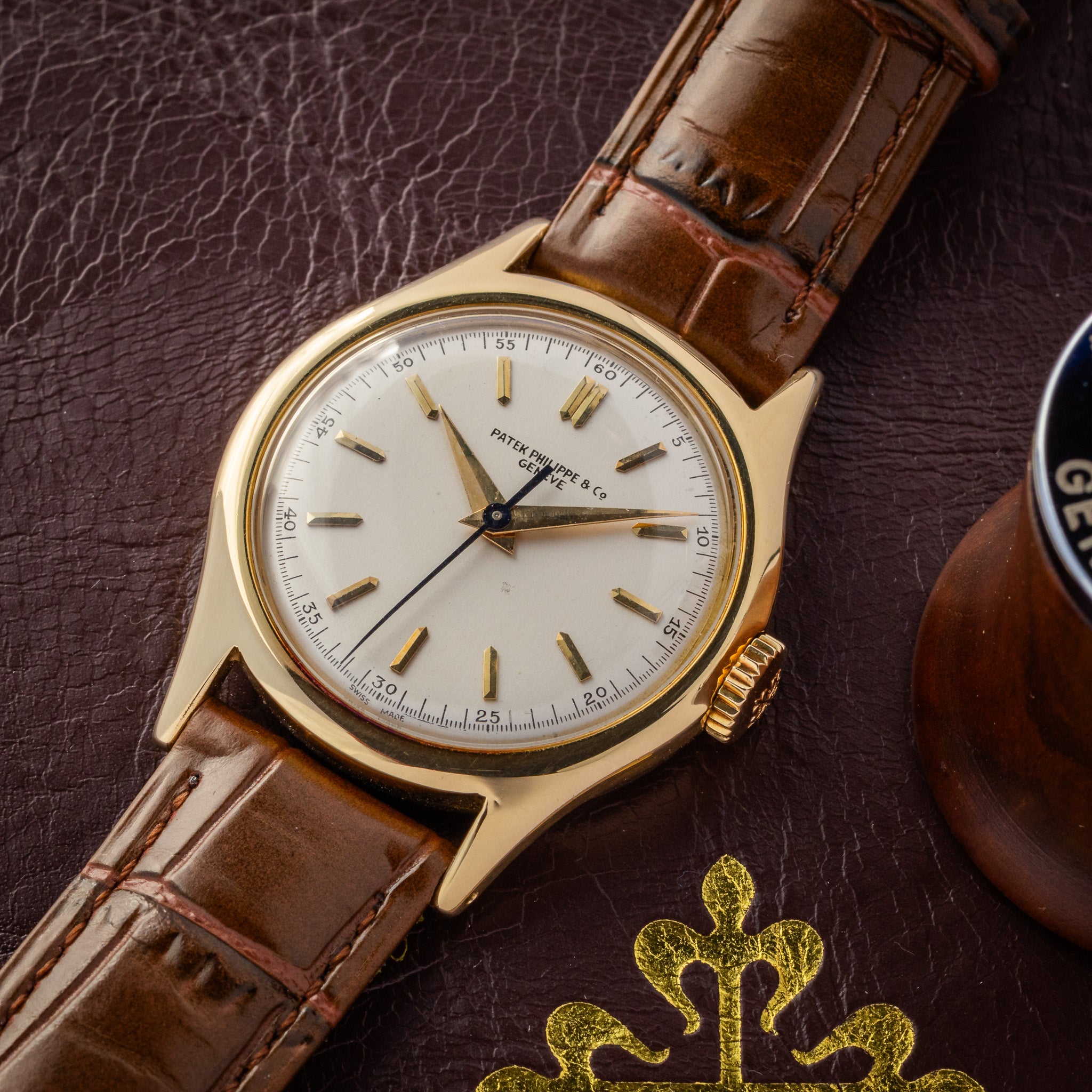 Patek - 565J - 1953 <br>Long Signature - Center Seconds <br>Extract